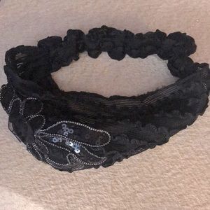 Wide sheer headband with flower appliqué